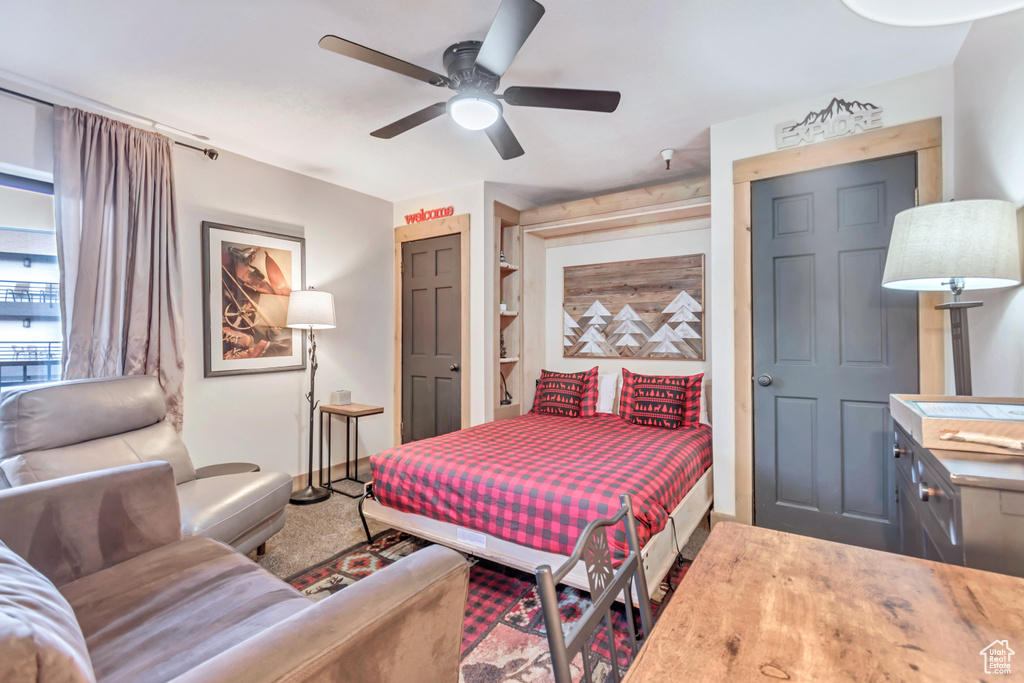 Bedroom featuring carpet flooring and ceiling fan