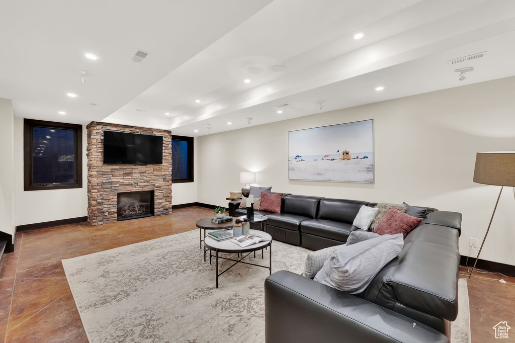 Tiled living room featuring a fireplace