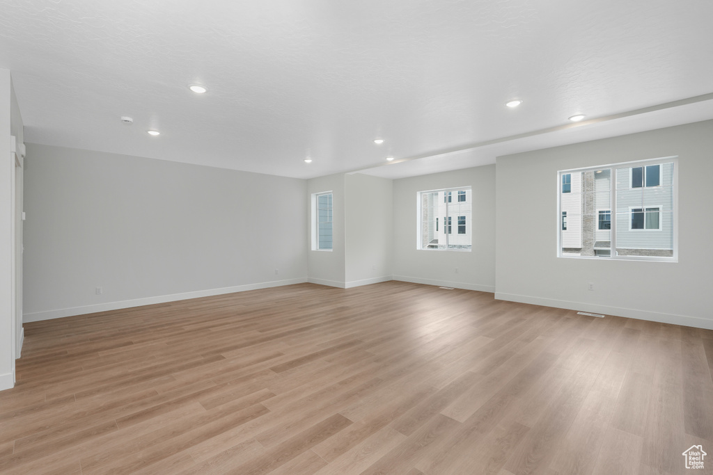 Empty room featuring light wood-type flooring
