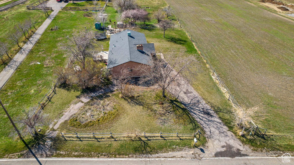 Birds eye view of property featuring a rural view