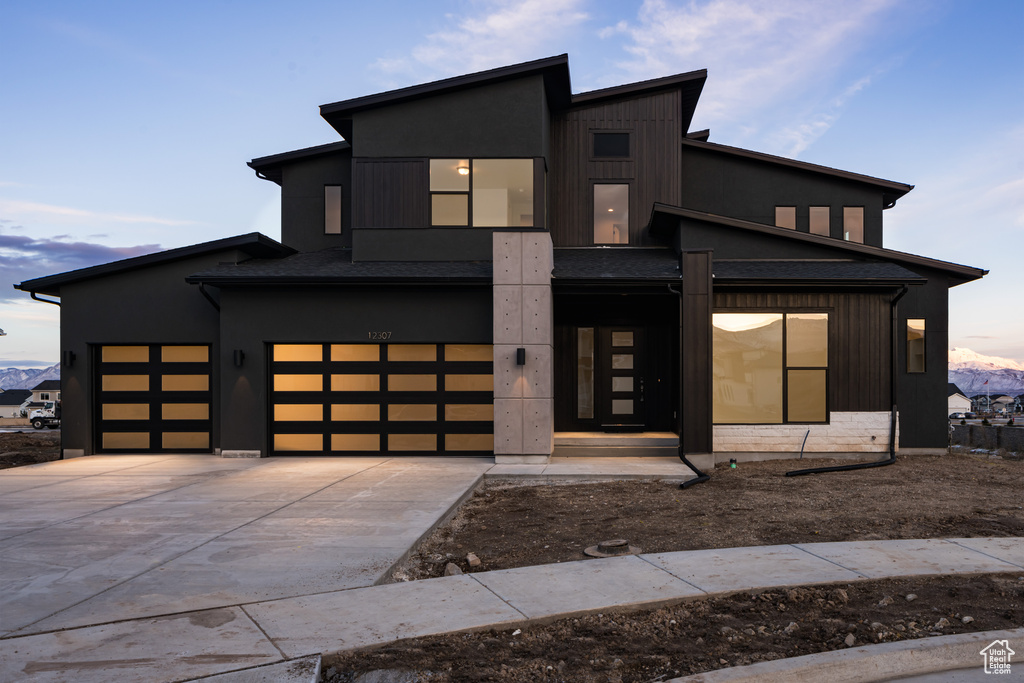 Contemporary house featuring a garage