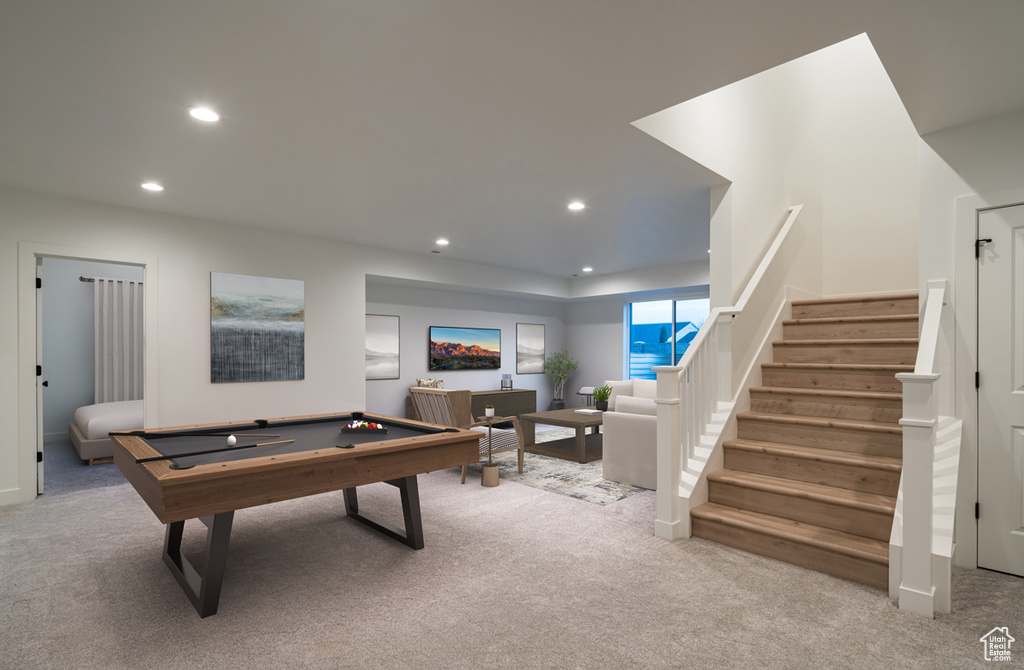 Recreation room featuring light carpet and billiards