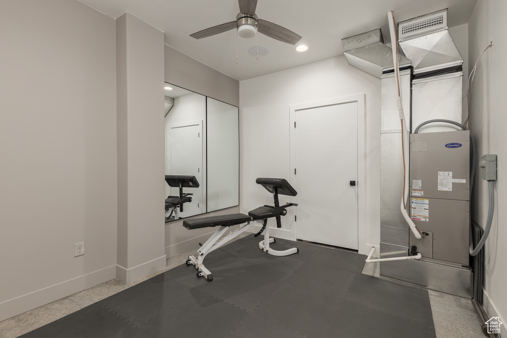 Exercise room featuring ceiling fan