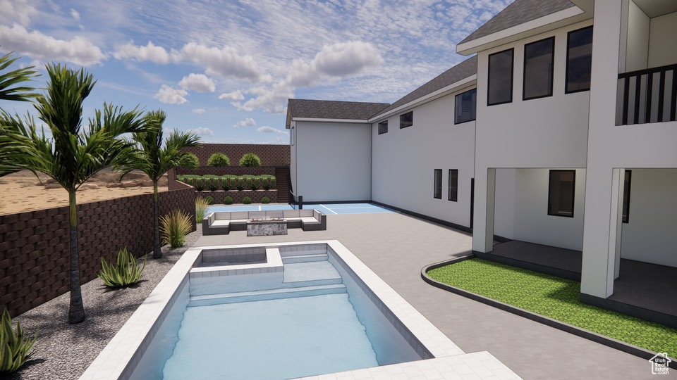 View of pool featuring an outdoor living space and a patio area