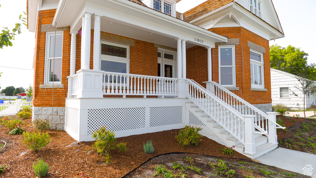 View of front facade featuring covered porch