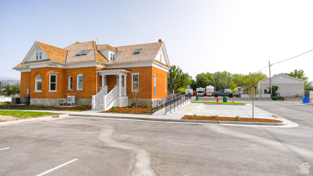 View of front facade featuring a garage