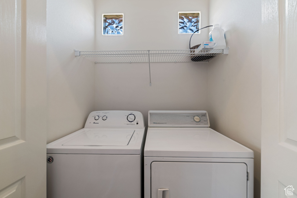 Clothes washing area with washing machine and dryer