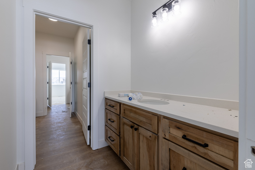 Bathroom featuring vanity and hardwood / wood-style flooring