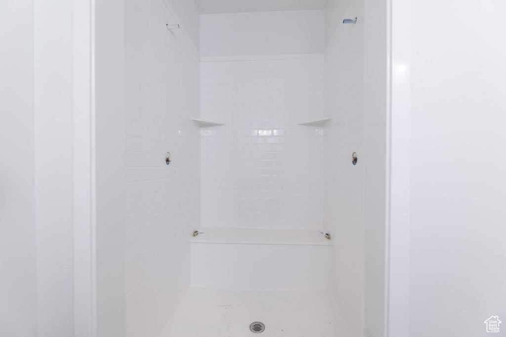 Interior space featuring tiled shower