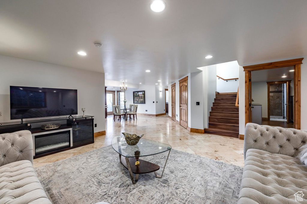 Living room featuring light tile floors