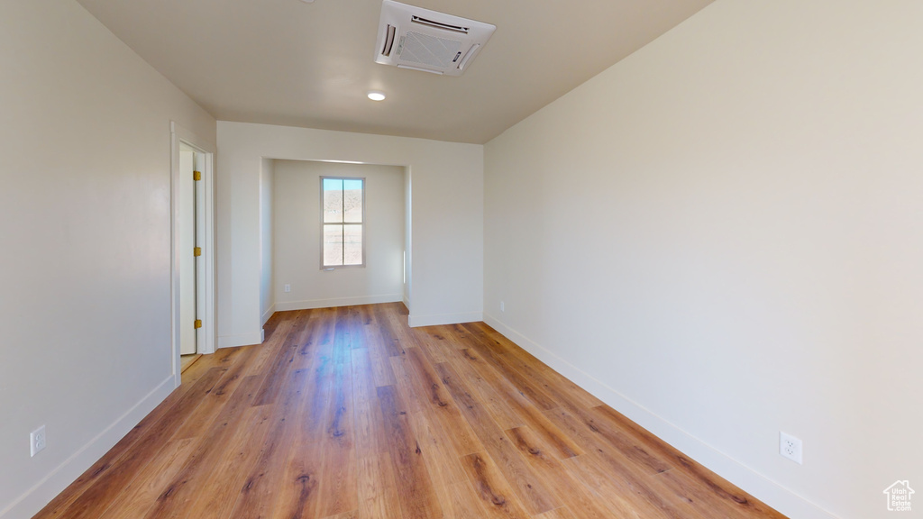 Empty room featuring light wood-type flooring