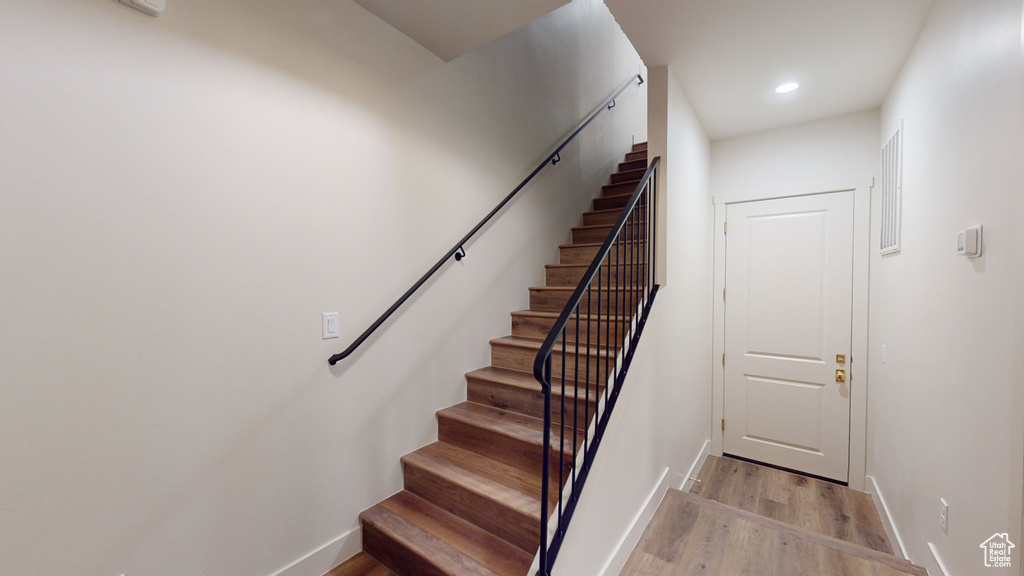 Stairway with wood-type flooring