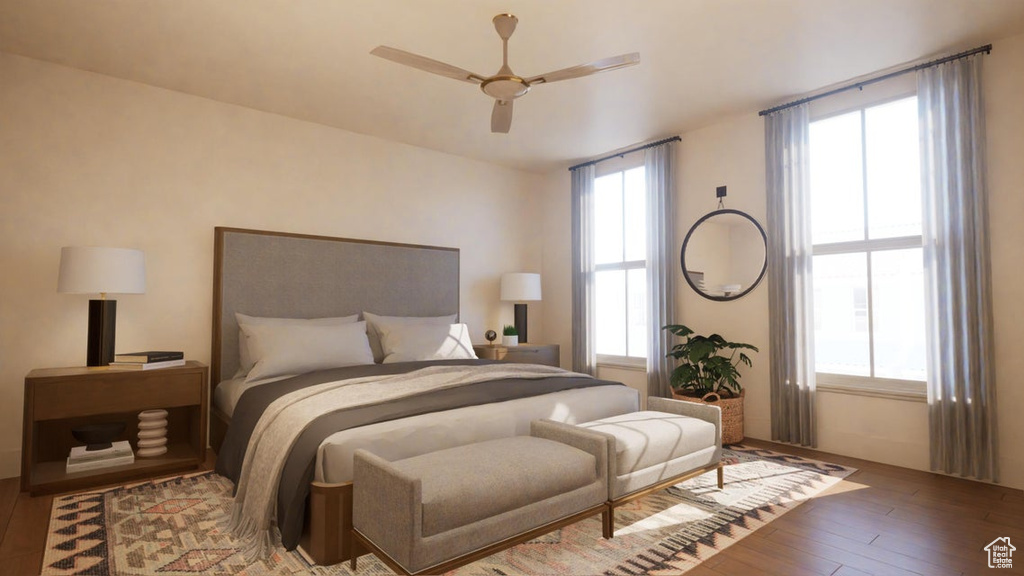 Bedroom with dark hardwood / wood-style flooring and ceiling fan