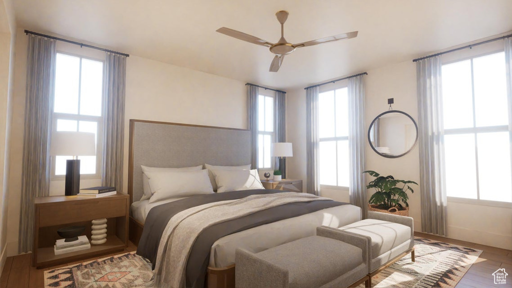 Bedroom with light wood-type flooring and ceiling fan