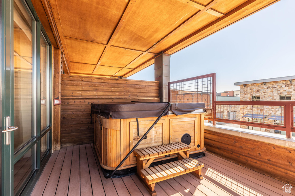 Wooden deck with a hot tub