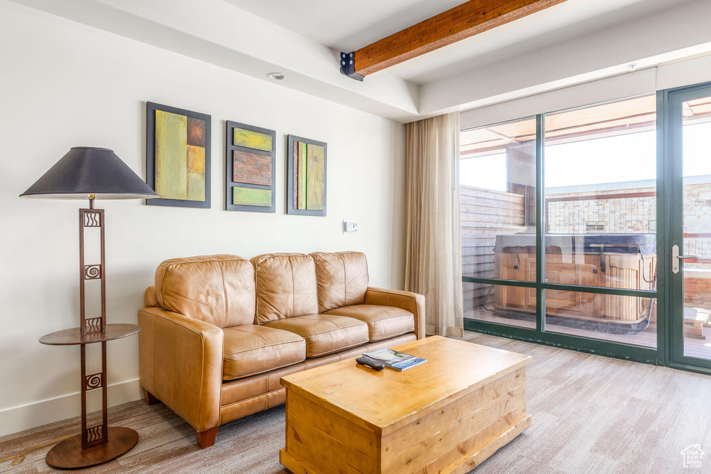 Living room with beam ceiling