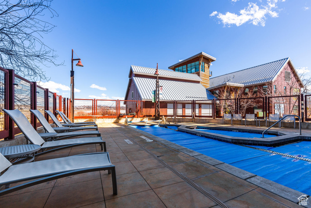 View of pool with a patio area