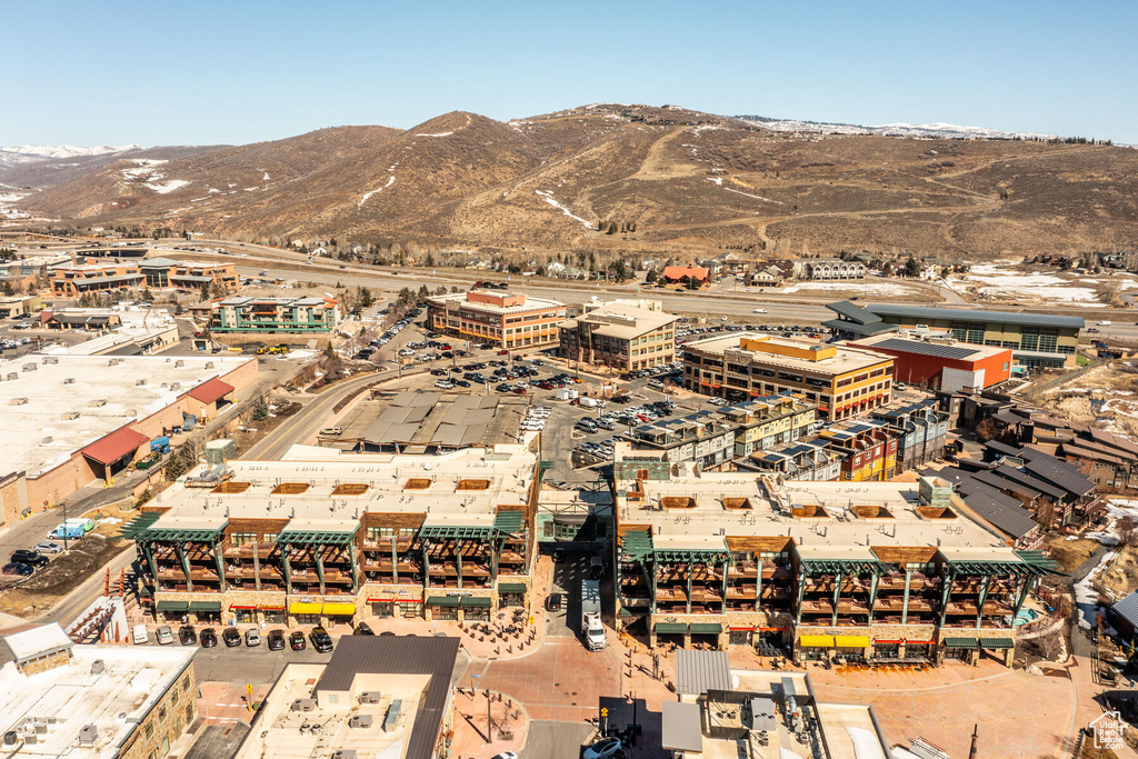 Birds eye view of property with a mountain view