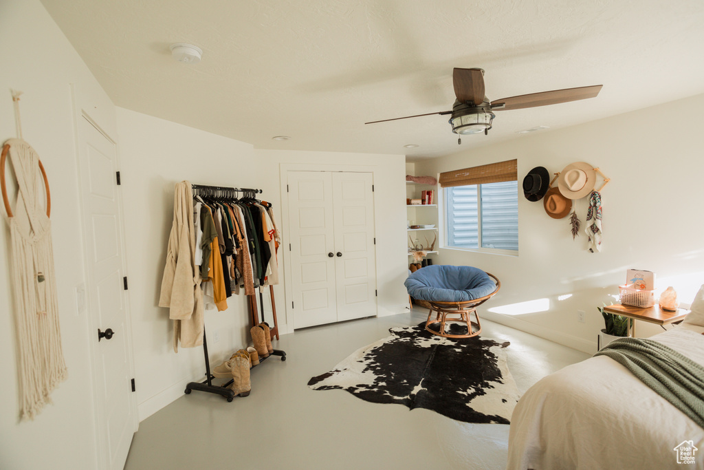 Bedroom featuring a closet and ceiling fan