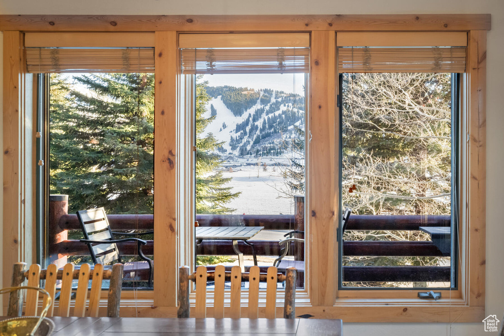 Doorway to outside with a mountain view