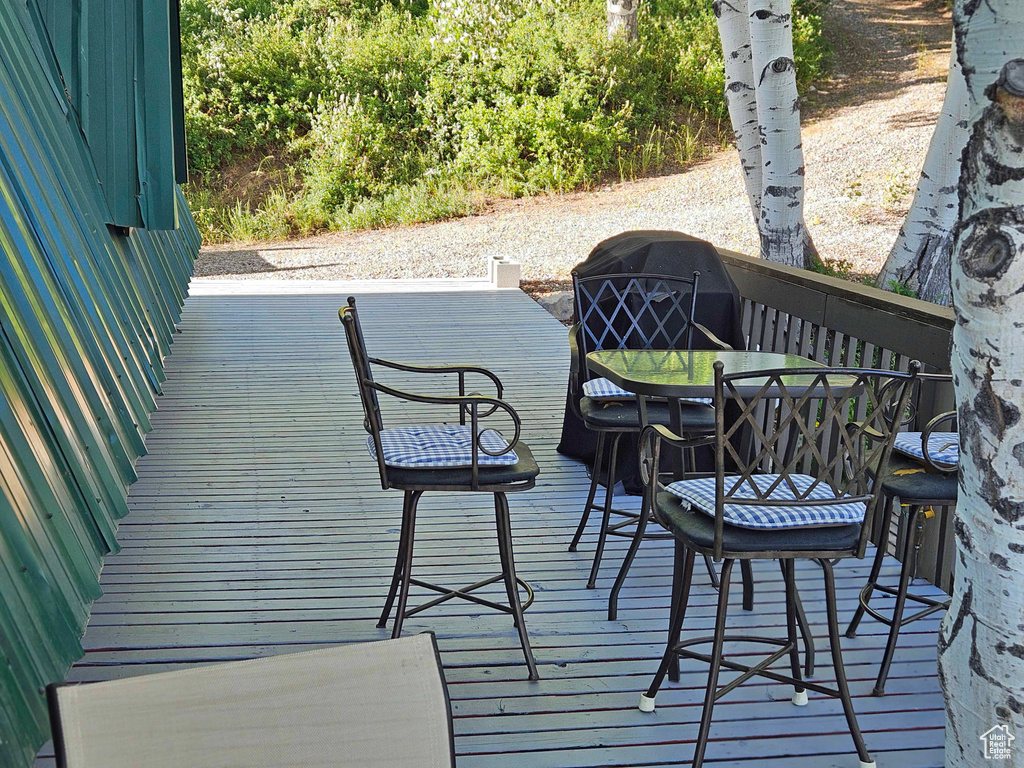 Wooden deck with outdoor dining space