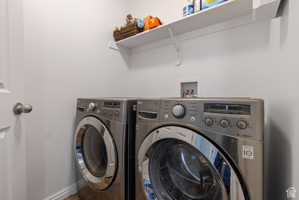 Laundry area featuring washer hookup and separate washer and dryer