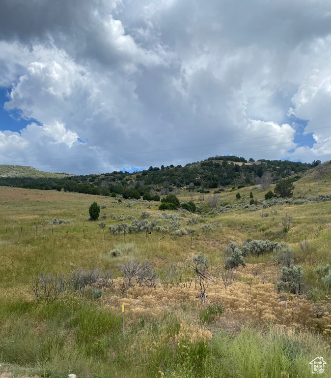 View of mountain feature with a rural view