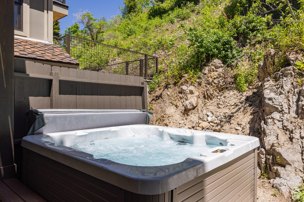 Exterior space featuring a hot tub