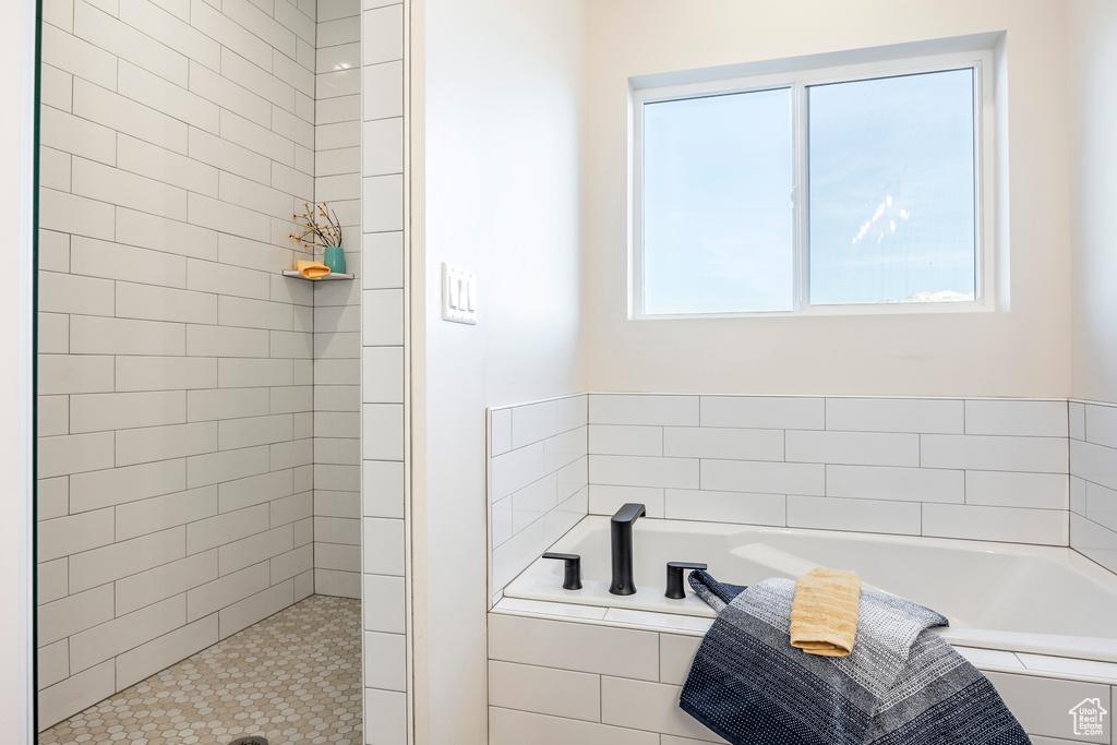 Bathroom with separate shower and tub