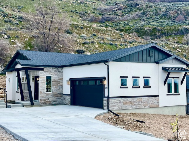 View of front of house with a garage