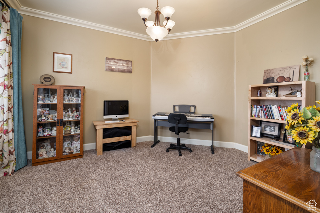 Carpeted office space featuring a notable chandelier and crown molding