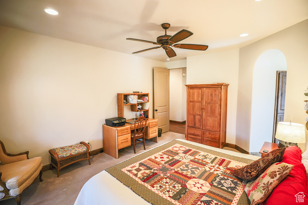 Bedroom with carpet and ceiling fan