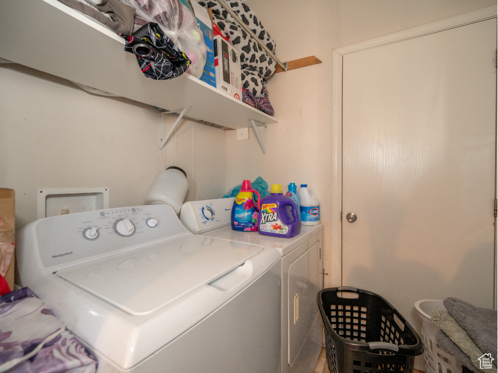 Clothes washing area with washer hookup and separate washer and dryer