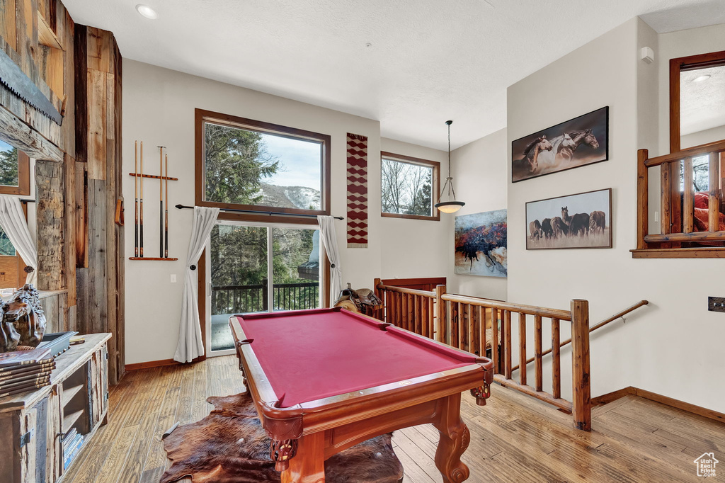 Recreation room featuring billiards and light wood-type flooring