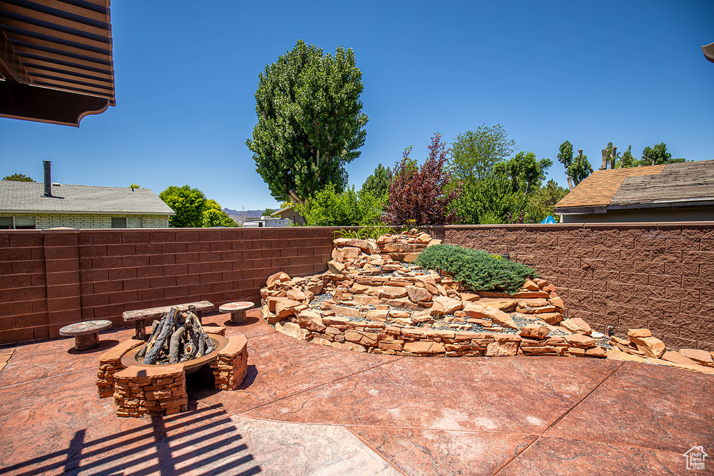View of patio / terrace featuring a fire pit