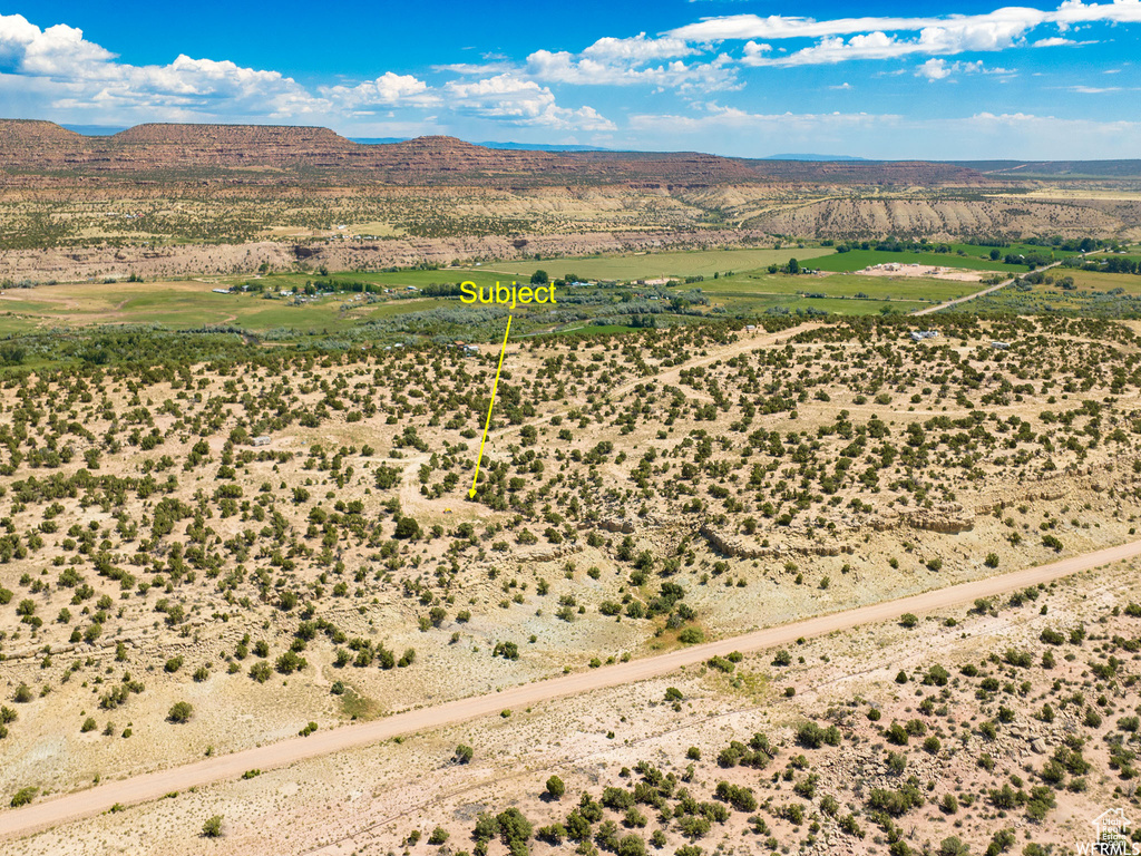 Birds eye view of property featuring a mountain view