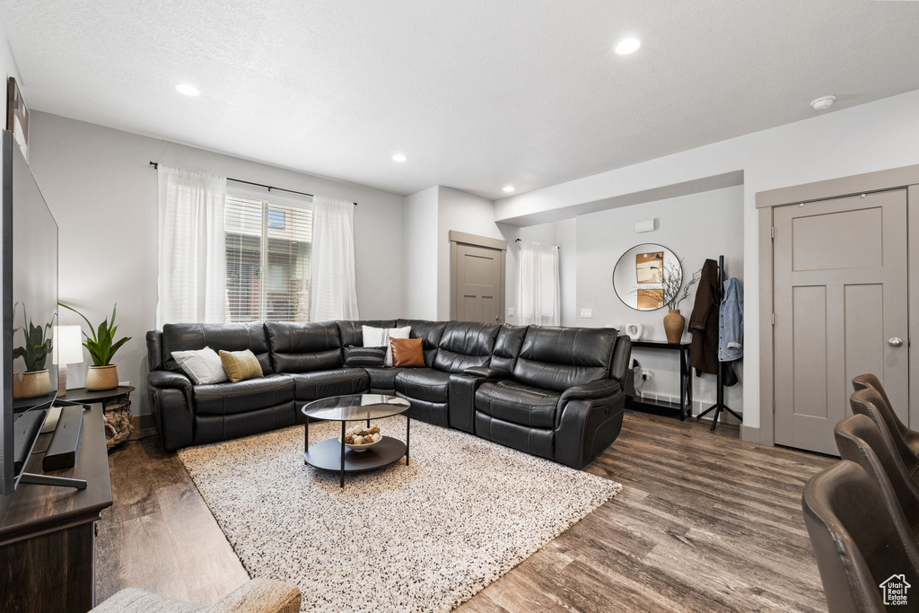 Living room featuring dark hardwood / wood-style floors