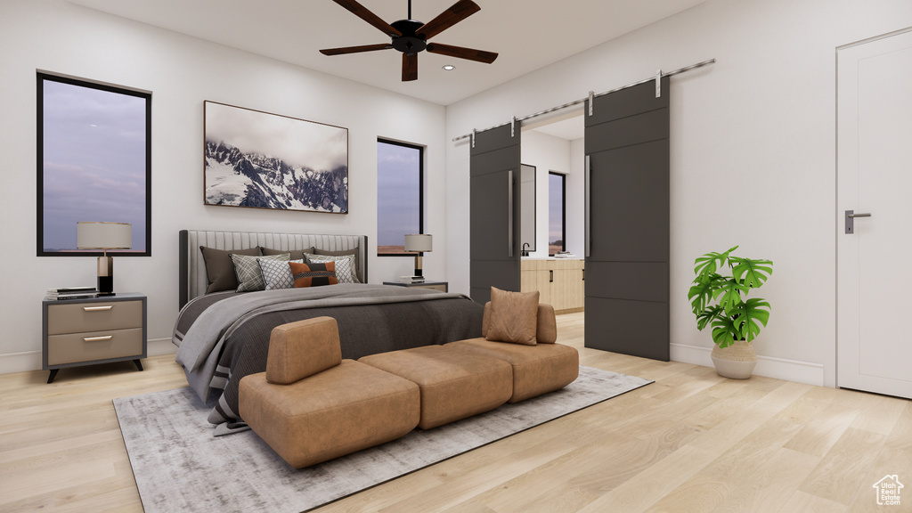 Bedroom with light wood-style flooring, recessed lighting, a barn door, connected bathroom, and ceiling fan