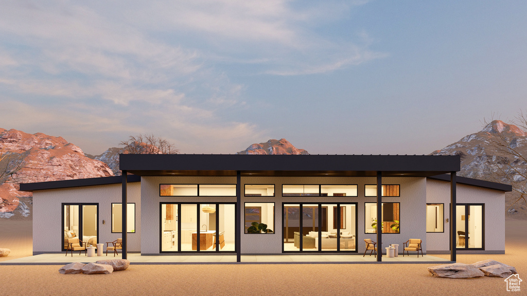 Rear view of house with a mountain view