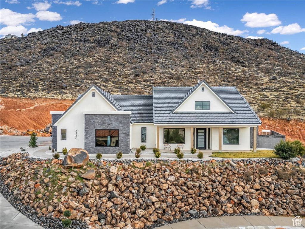 Modern farmhouse style home featuring a mountain view