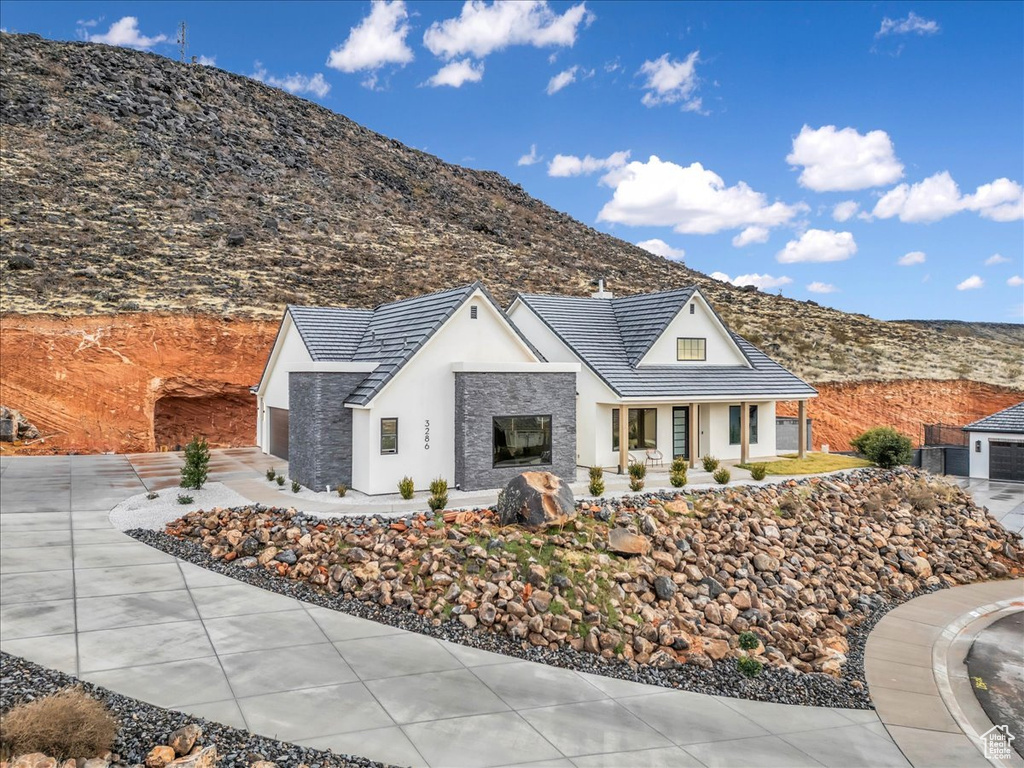 View of front of property featuring a mountain view