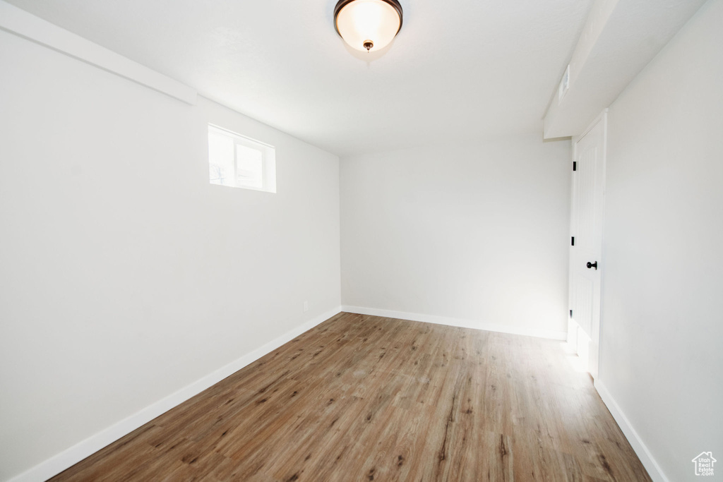 Spare room with light wood-type flooring