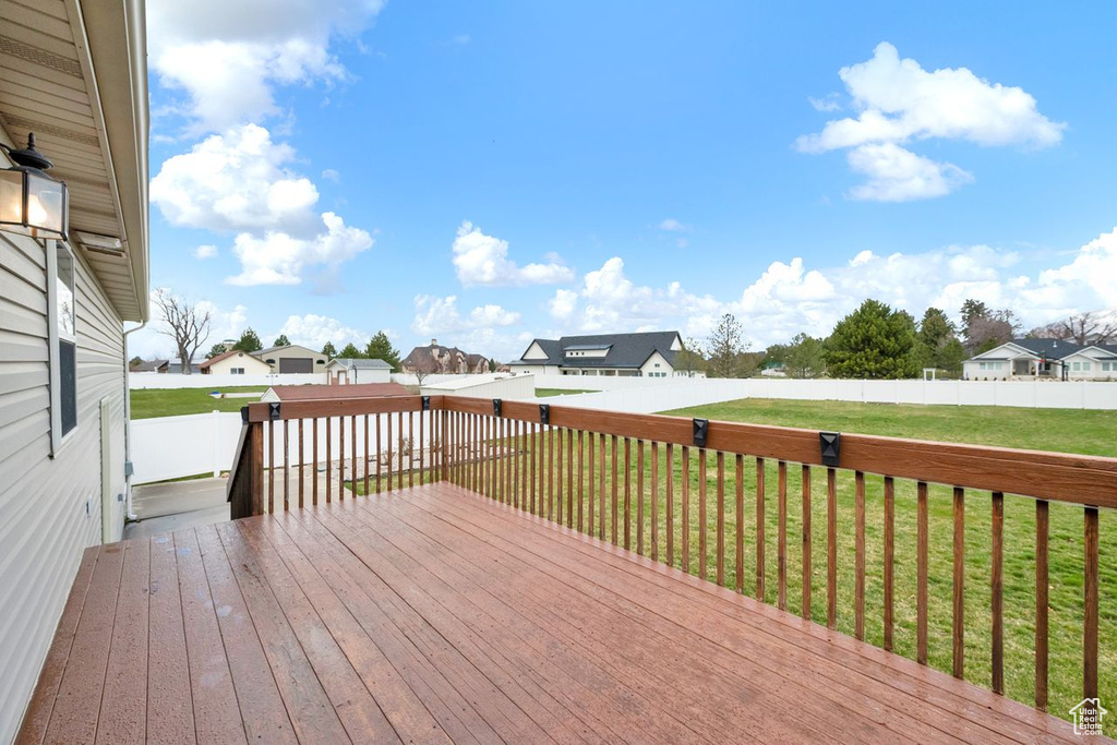 Wooden deck with a yard