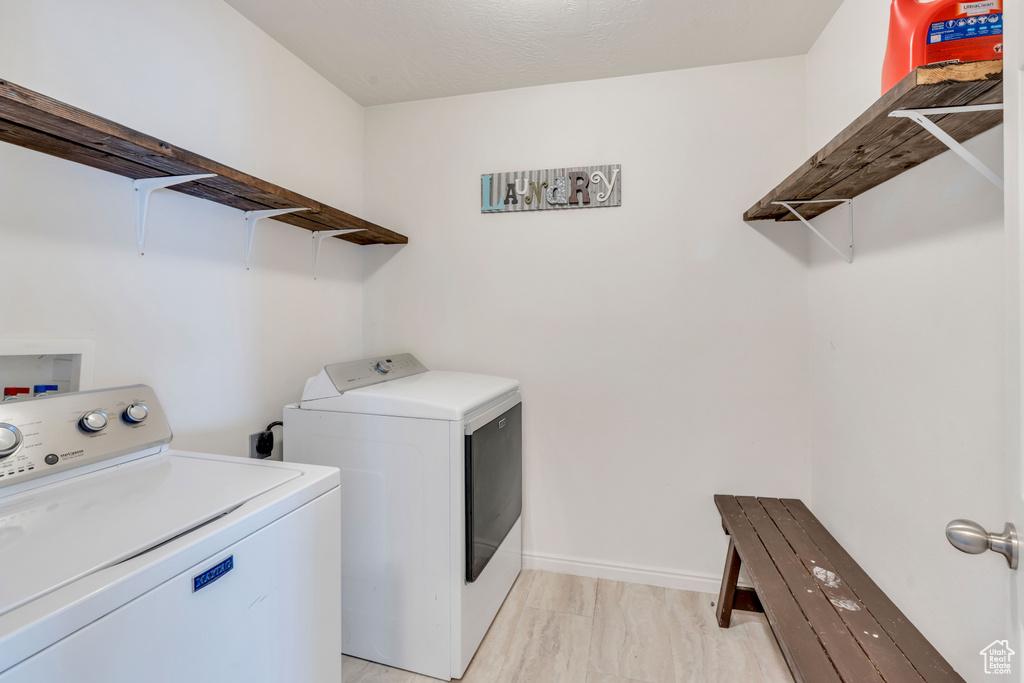 Clothes washing area with hookup for an electric dryer and washer and dryer