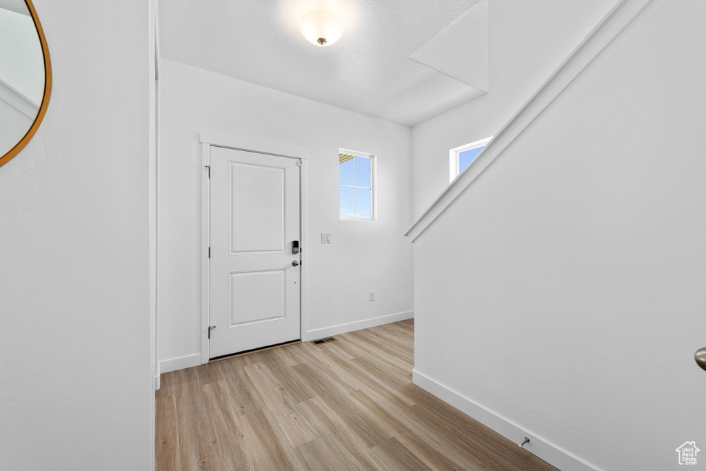 Entryway featuring light wood-type flooring