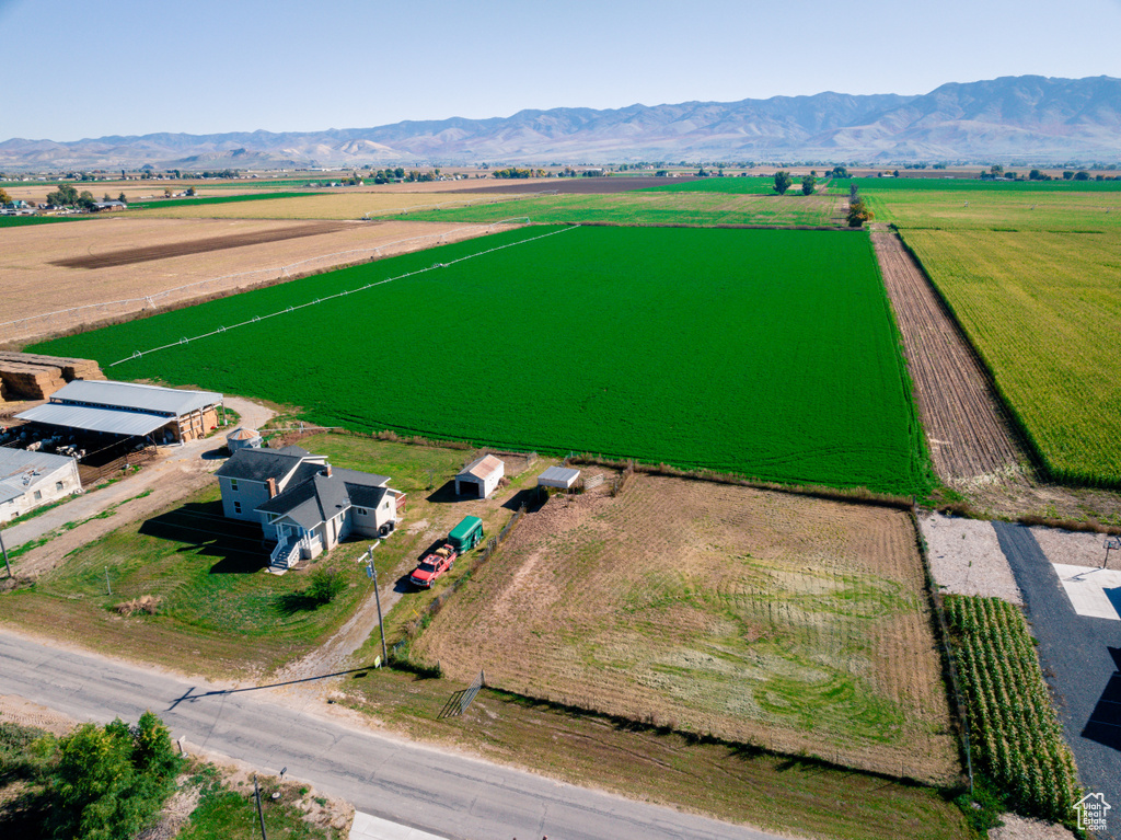 Birds eye view of property with a mountain view and a rural view