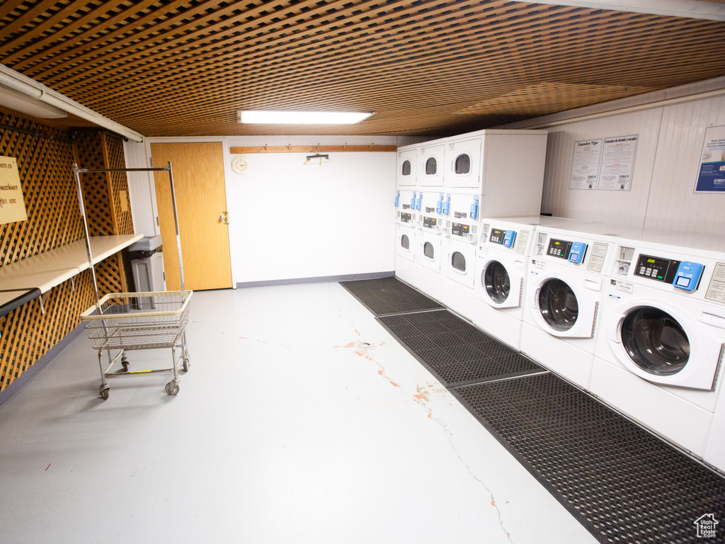 Washroom with washer and clothes dryer and stacked washer and dryer