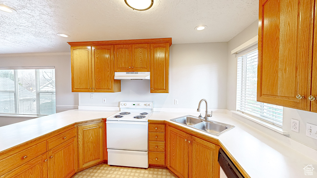 Kitchen with dishwashing machine, light tile flooring, white electric stove, sink, and a textured ceiling