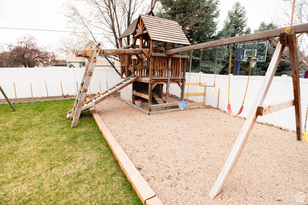 View of playground with a yard