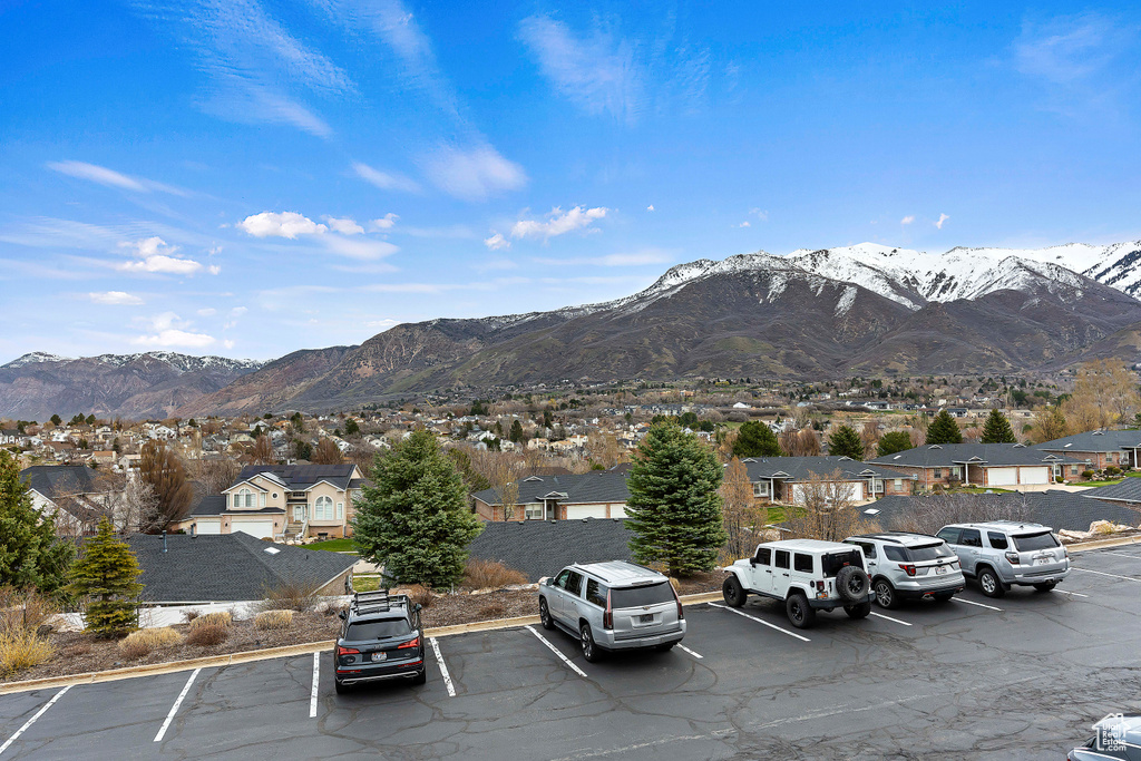 View of car parking featuring a mountain view